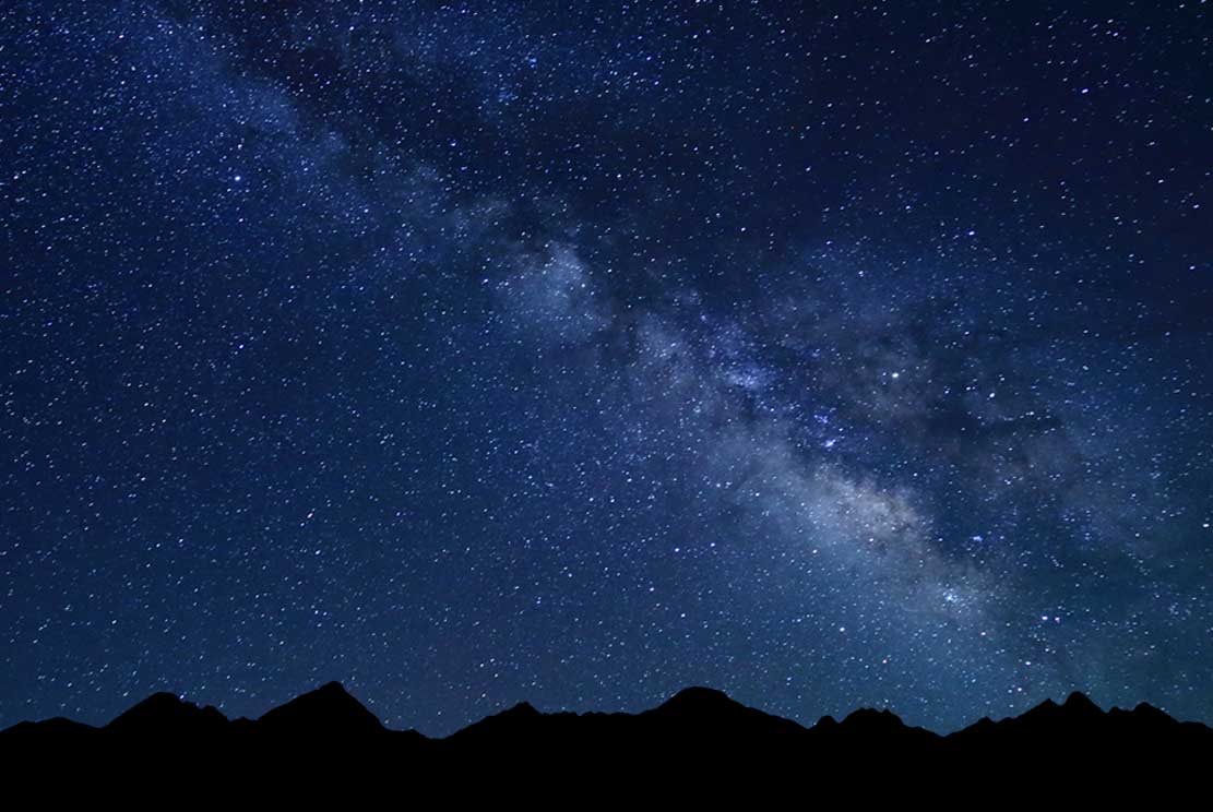 2 starry night with Milky way and silhouette of High Tatras mountains