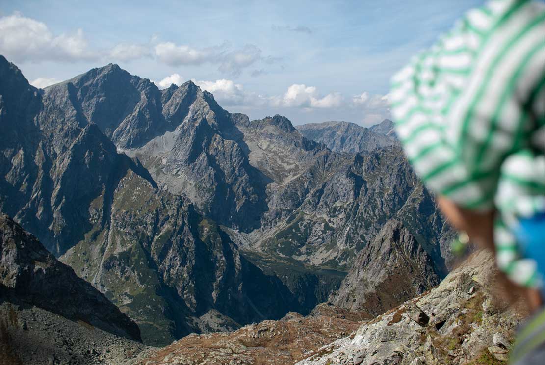 3-aurora-van a person overlooking beautiful mountains from 2290 meters above the sea level