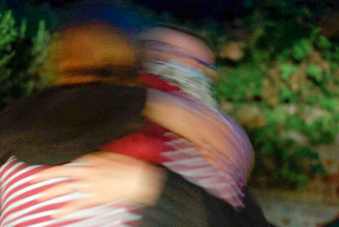 2 two friends hugging each other intensely while saying farewell